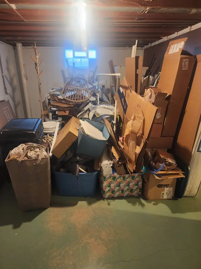 Roll-off dumpster container at job site for 6 Yard Dumpster Rental in Greendale